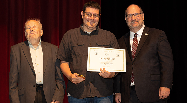 Setliff presented awards on stage.